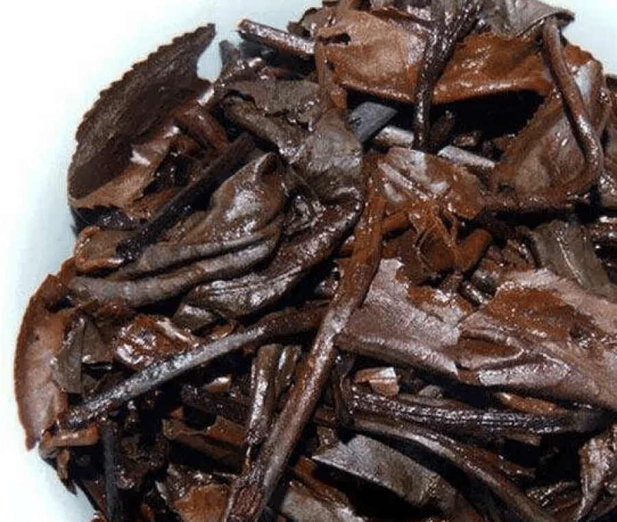 Brewed leaves of ripe pu erh with dry and hard texture