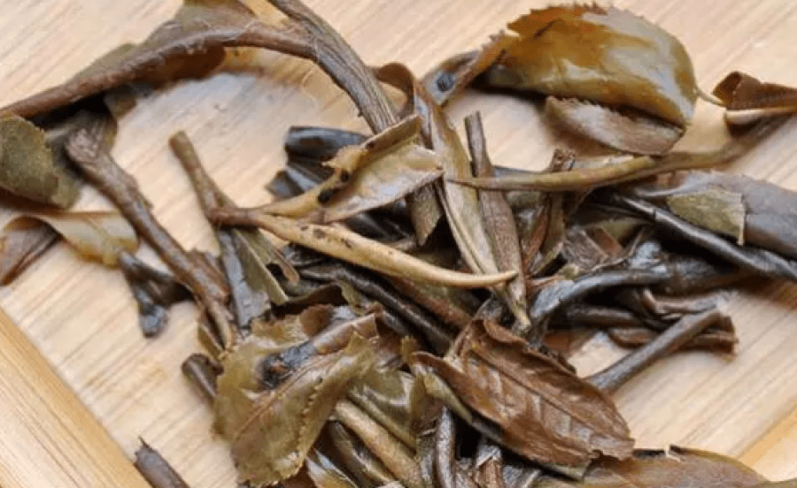 Brewed tea leaves with burnt marks